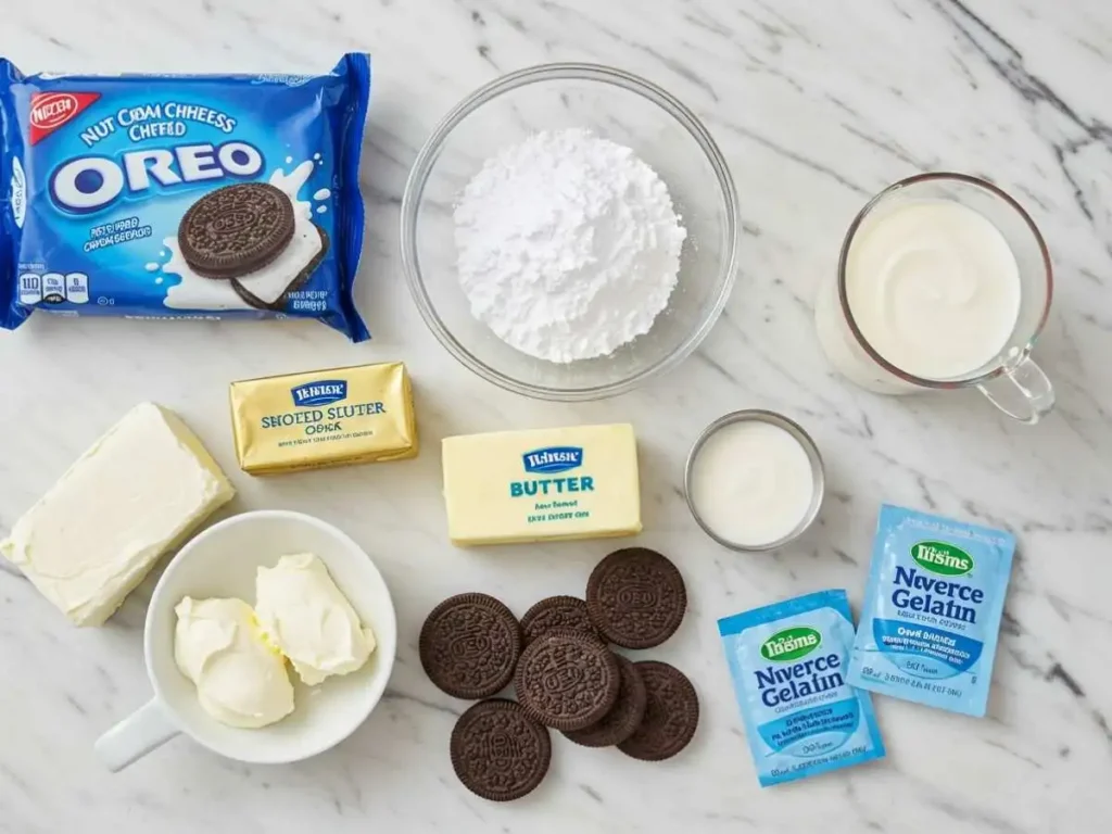 Ingredientes para pastel de Oreo: galletas, queso crema, mantequilla y azúcar glass